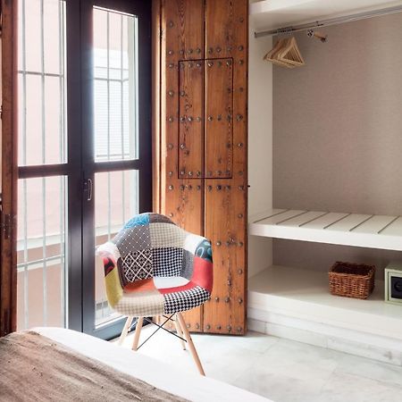 Apartamentos La Casa Del Pozo Santo Sevilla Bagian luar foto