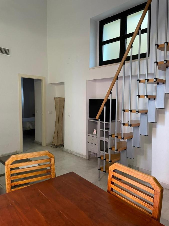 Apartamentos La Casa Del Pozo Santo Sevilla Bagian luar foto