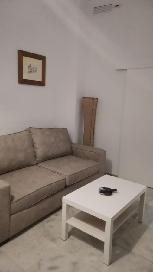 Apartamentos La Casa Del Pozo Santo Sevilla Bagian luar foto
