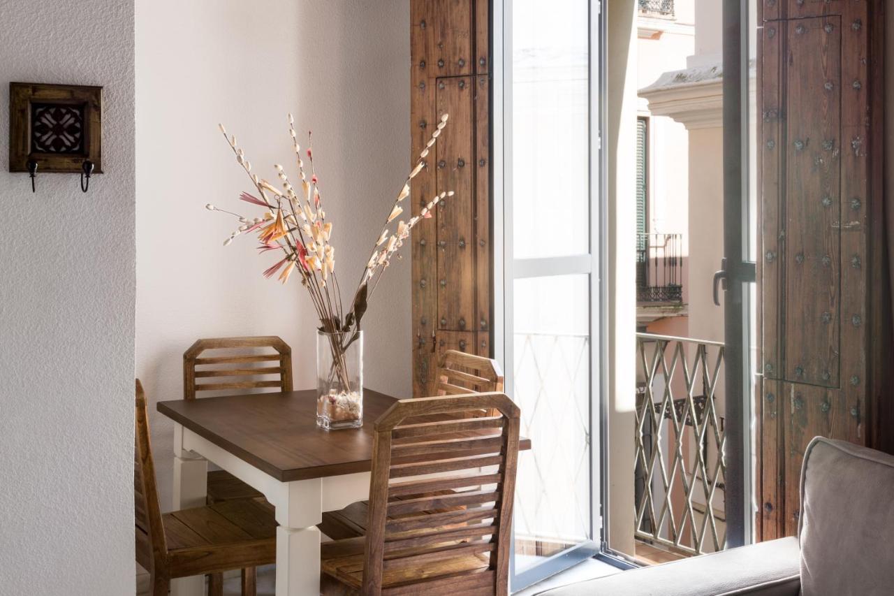 Apartamentos La Casa Del Pozo Santo Sevilla Bagian luar foto