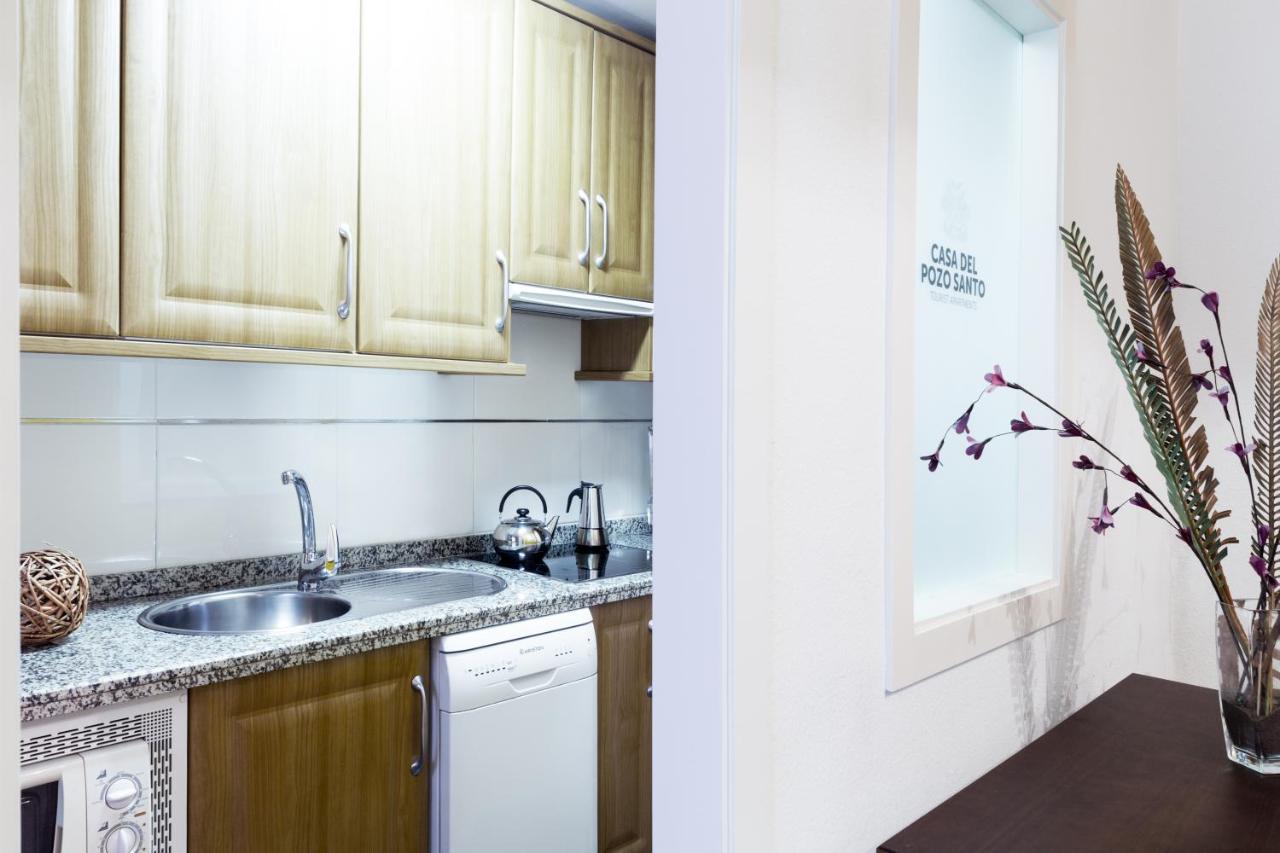 Apartamentos La Casa Del Pozo Santo Sevilla Bagian luar foto