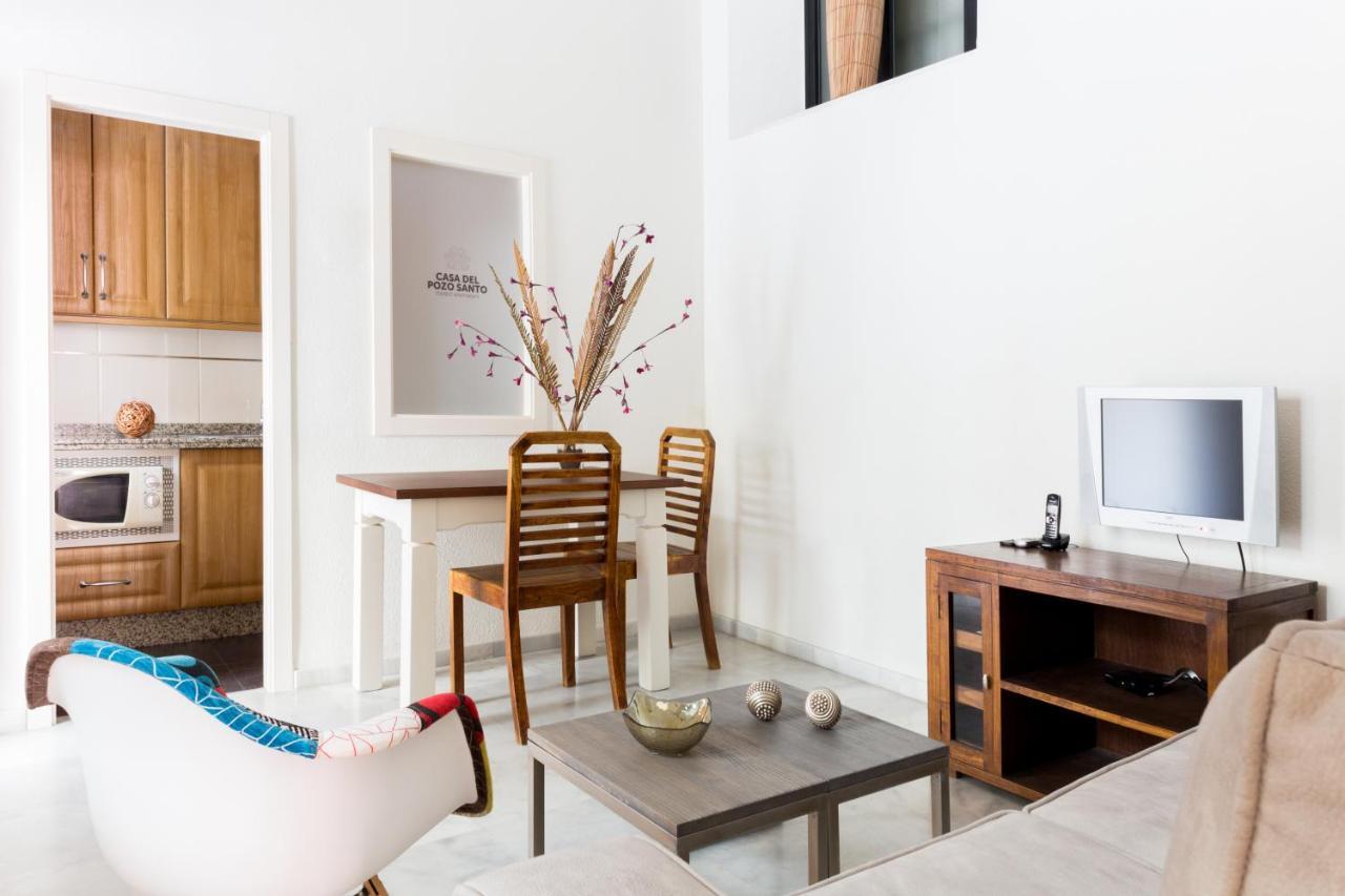 Apartamentos La Casa Del Pozo Santo Sevilla Bagian luar foto