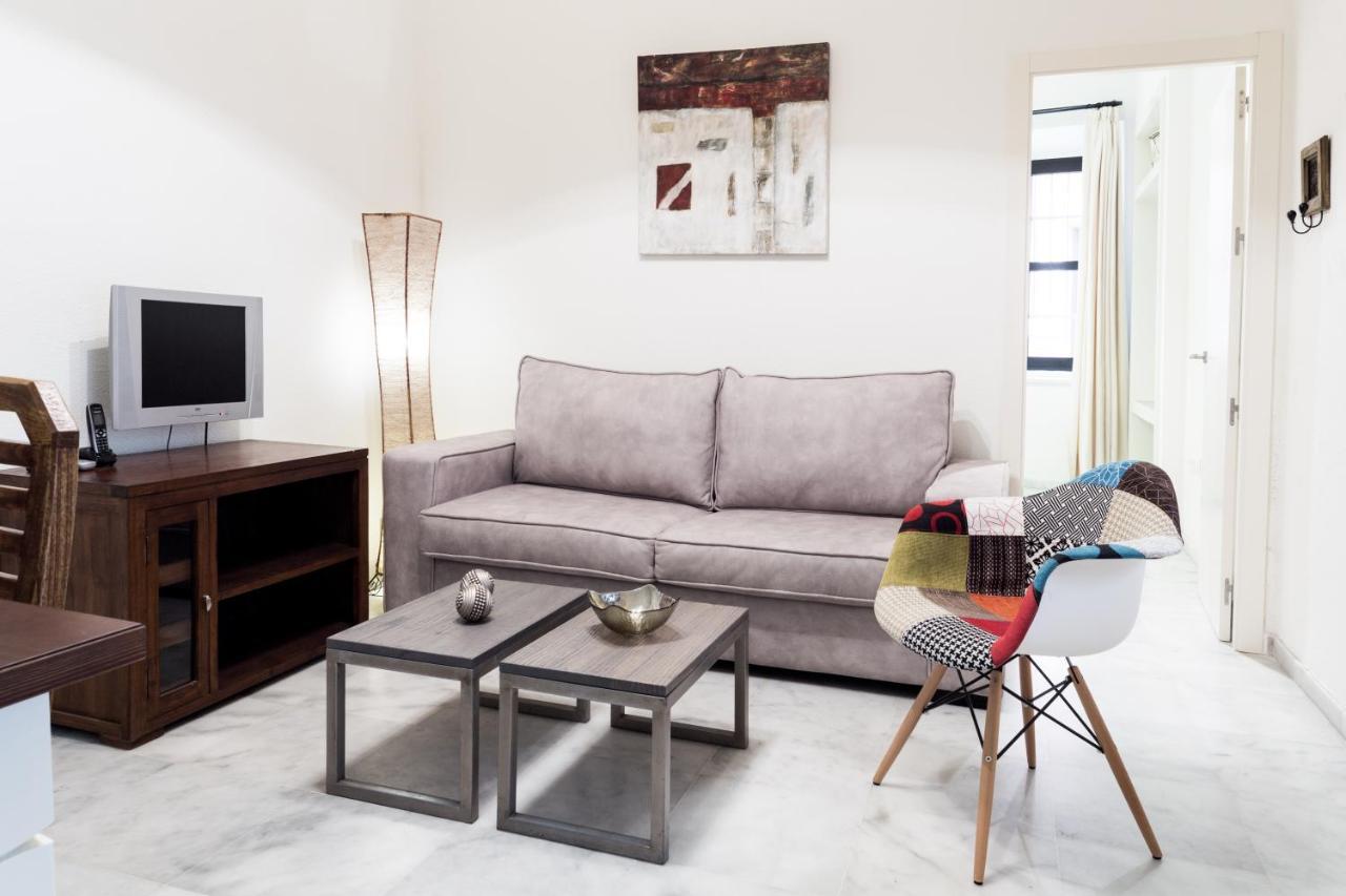 Apartamentos La Casa Del Pozo Santo Sevilla Bagian luar foto