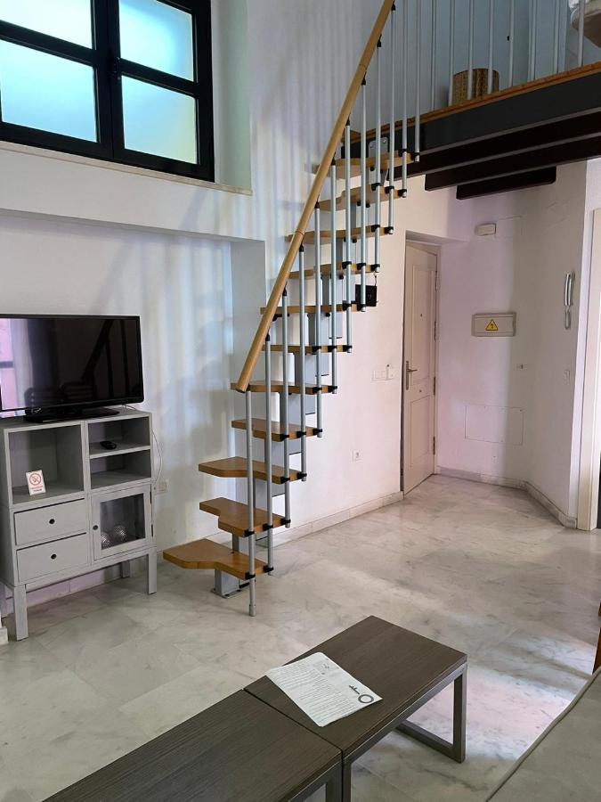 Apartamentos La Casa Del Pozo Santo Sevilla Bagian luar foto