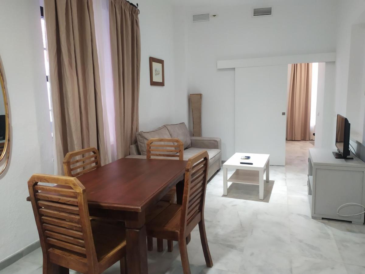 Apartamentos La Casa Del Pozo Santo Sevilla Bagian luar foto