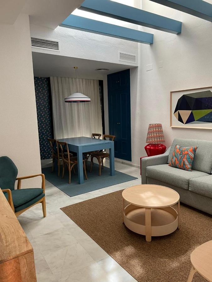 Apartamentos La Casa Del Pozo Santo Sevilla Bagian luar foto