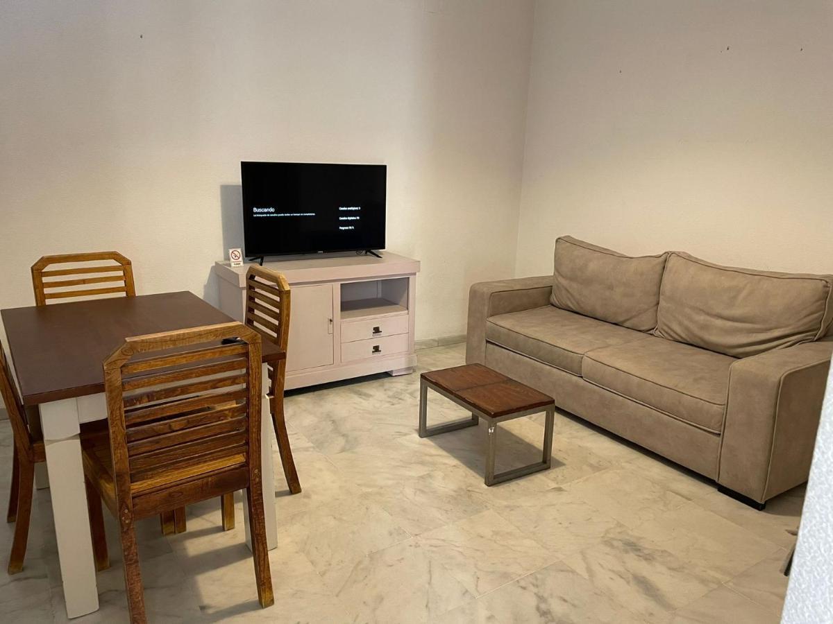 Apartamentos La Casa Del Pozo Santo Sevilla Bagian luar foto