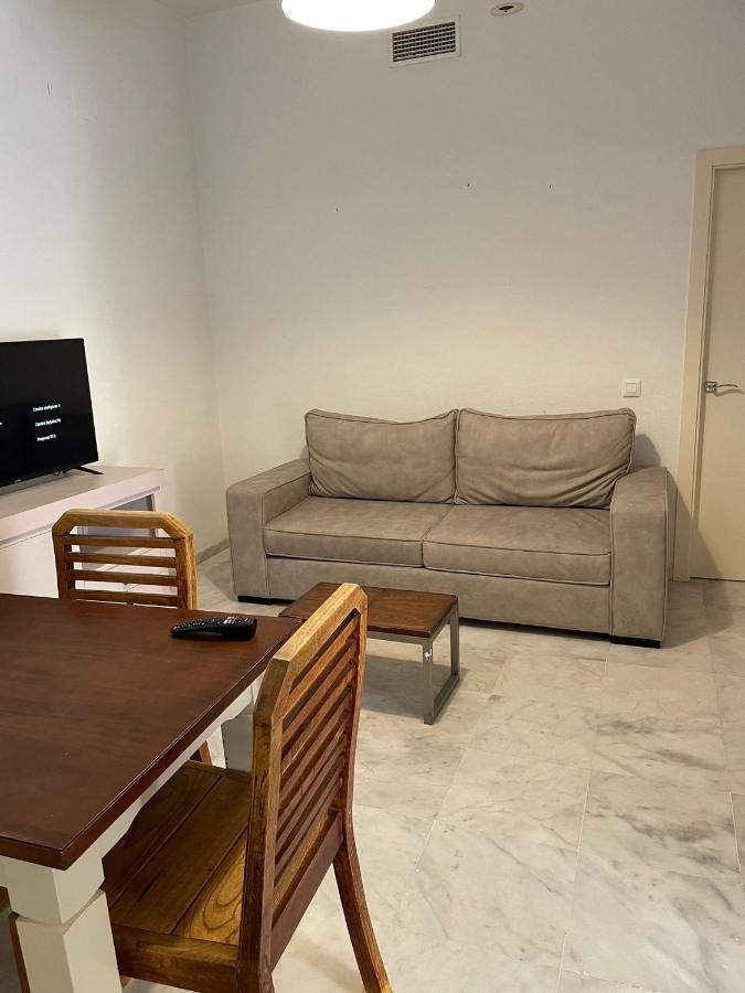 Apartamentos La Casa Del Pozo Santo Sevilla Bagian luar foto