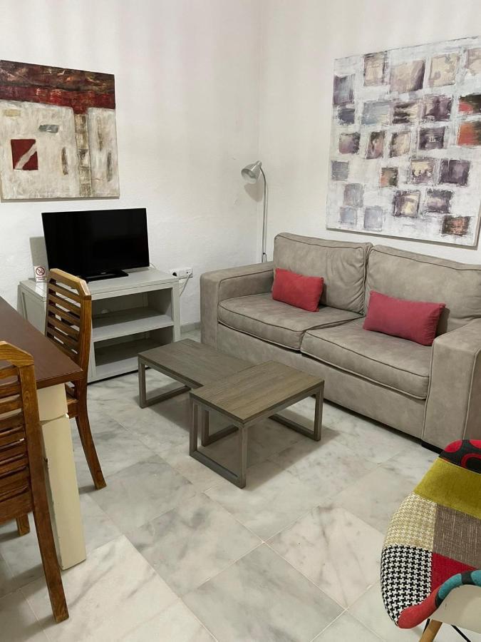 Apartamentos La Casa Del Pozo Santo Sevilla Bagian luar foto