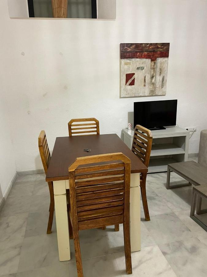 Apartamentos La Casa Del Pozo Santo Sevilla Bagian luar foto