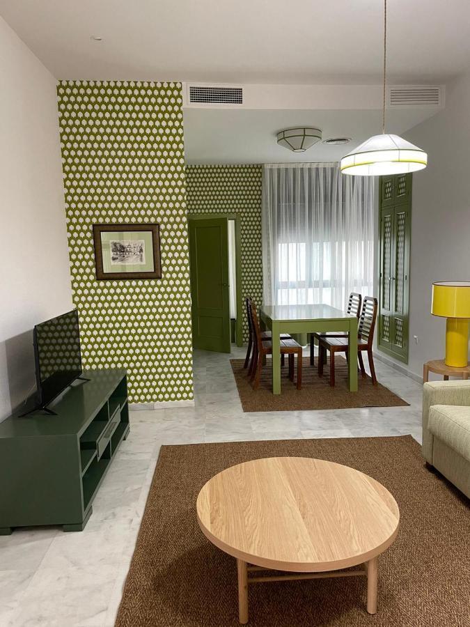 Apartamentos La Casa Del Pozo Santo Sevilla Bagian luar foto