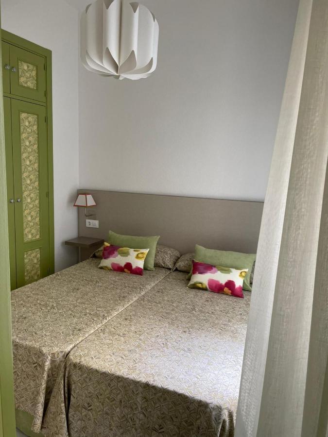Apartamentos La Casa Del Pozo Santo Sevilla Bagian luar foto