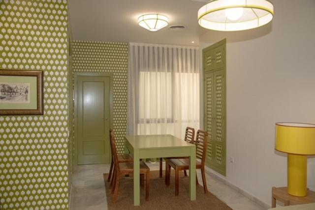 Apartamentos La Casa Del Pozo Santo Sevilla Bagian luar foto