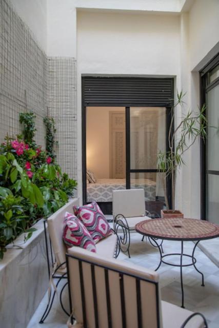 Apartamentos La Casa Del Pozo Santo Sevilla Bagian luar foto