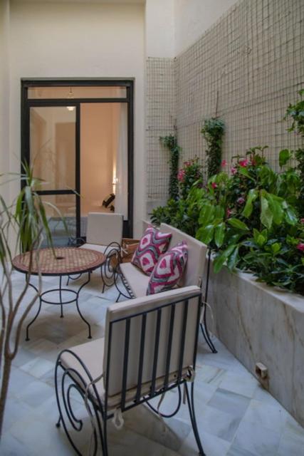 Apartamentos La Casa Del Pozo Santo Sevilla Bagian luar foto