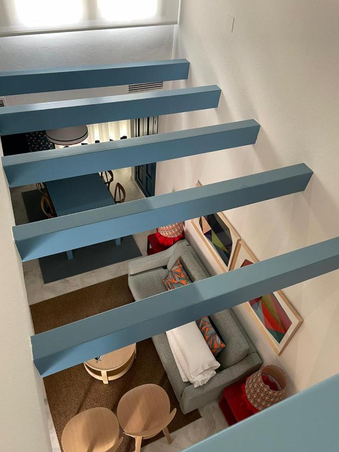 Apartamentos La Casa Del Pozo Santo Sevilla Bagian luar foto