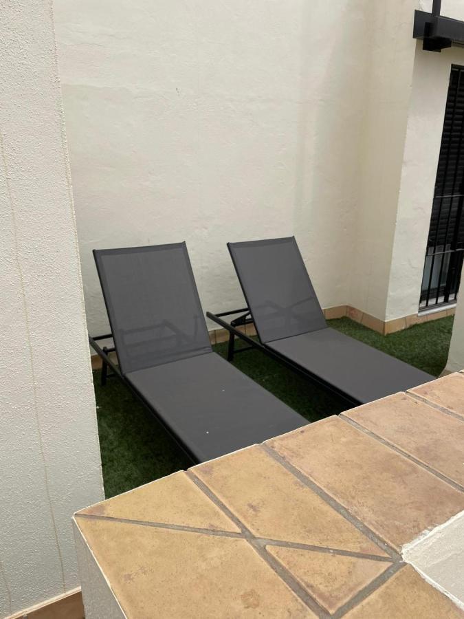 Apartamentos La Casa Del Pozo Santo Sevilla Bagian luar foto