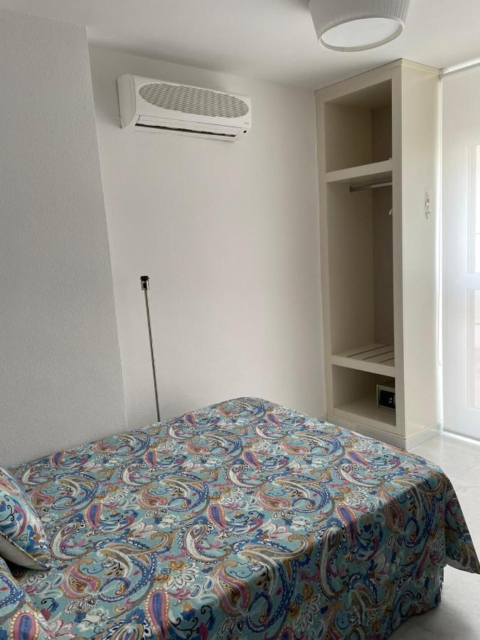 Apartamentos La Casa Del Pozo Santo Sevilla Bagian luar foto