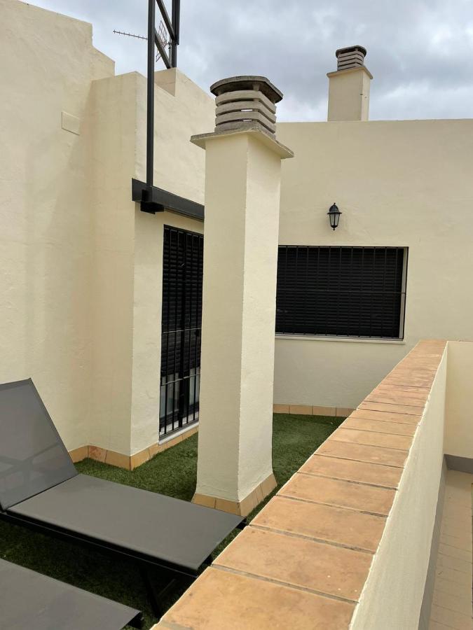 Apartamentos La Casa Del Pozo Santo Sevilla Bagian luar foto