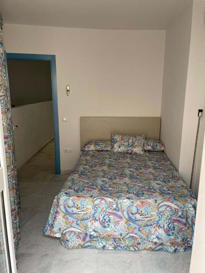 Apartamentos La Casa Del Pozo Santo Sevilla Bagian luar foto