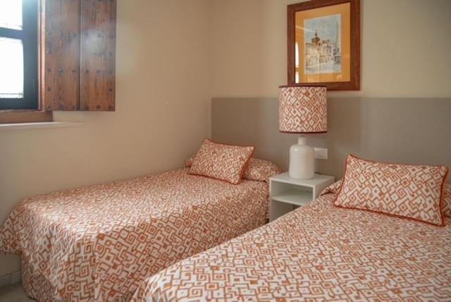 Apartamentos La Casa Del Pozo Santo Sevilla Bagian luar foto