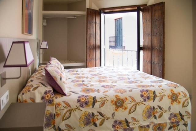Apartamentos La Casa Del Pozo Santo Sevilla Bagian luar foto